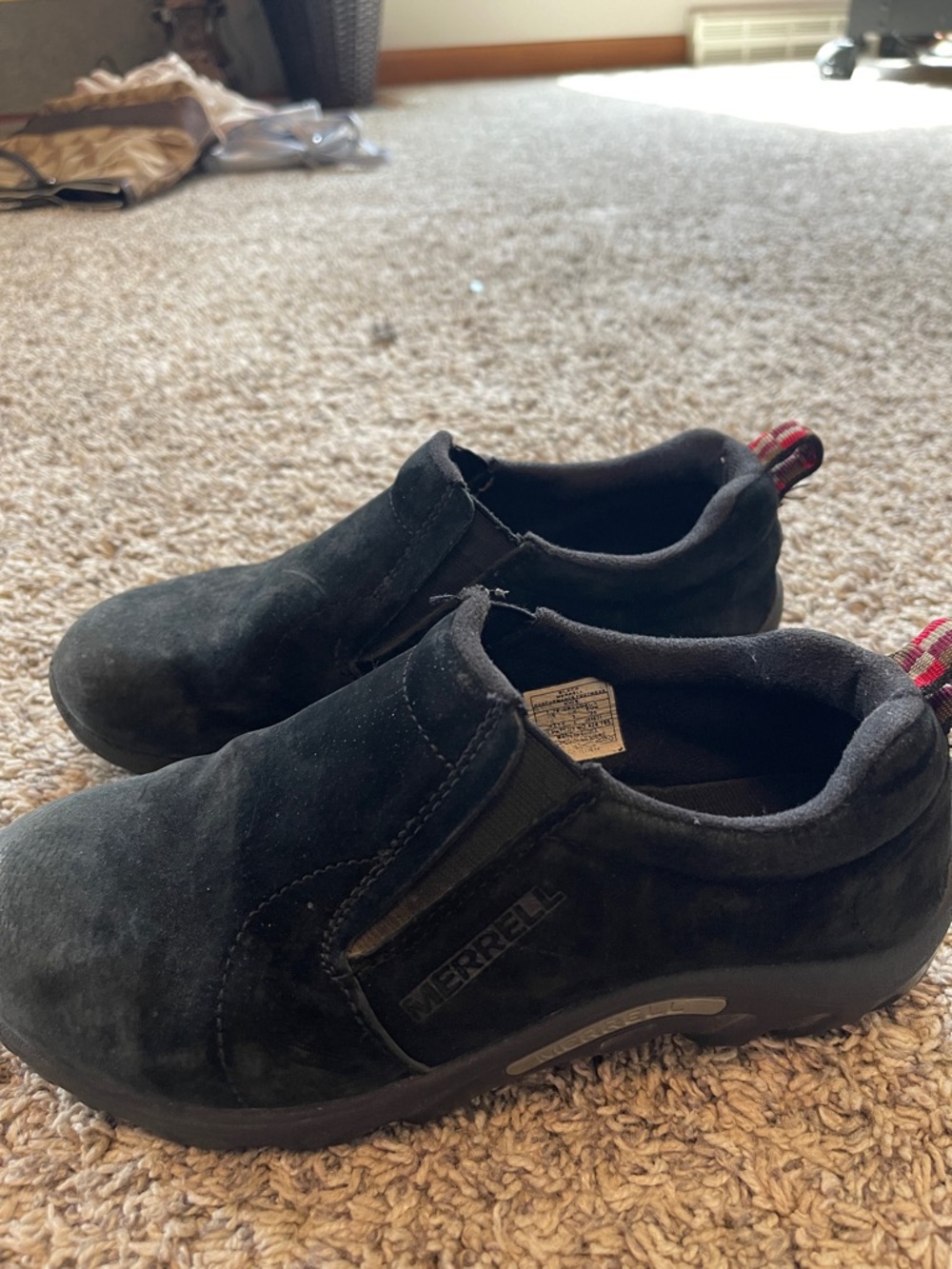 Merrell Black Slip-On Suede Casual Shoes with Red Heel Tabs